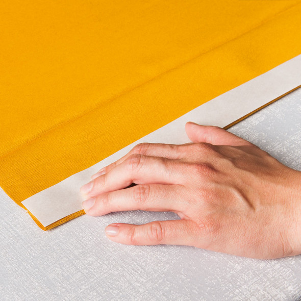 Taśma termo siatka na papierze z klejem do skracania tkanin - 5 cm